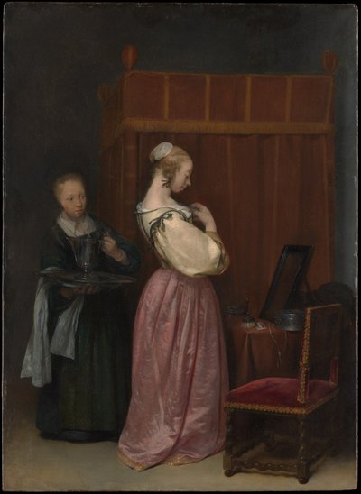 Young woman at her toilet with a servant by Gerard ter Borch